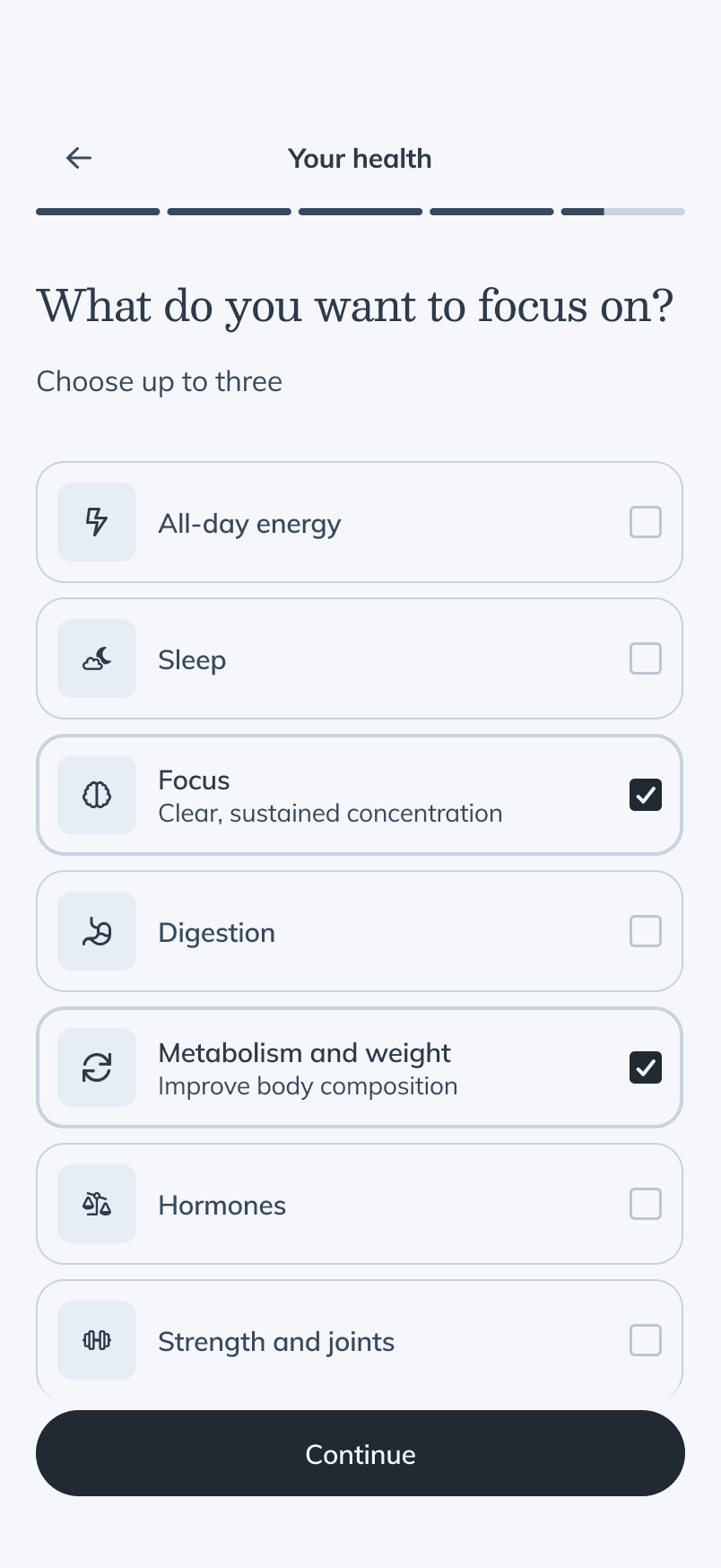 The same goals screen with Focus and Metabolism selected, each revealing a one-line descriptor, and a Continue button now present